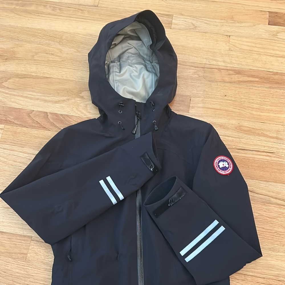 Canada goose 
, xs, black raincoat, always my number 1 for rainy days.